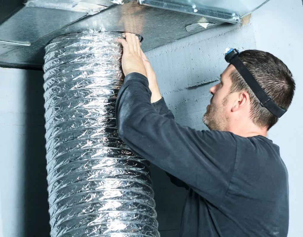 checking on an air vent