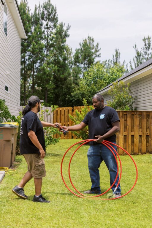 hvac maintenance checklist two men backyard cleaning tools Pro Shine Professional Cleaning