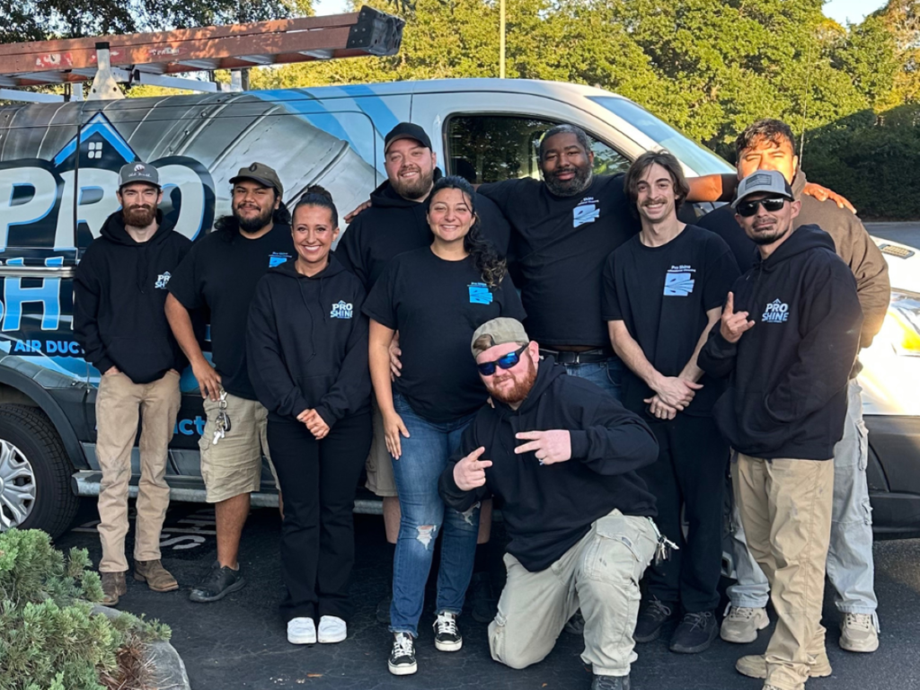 office cleaning Pro Shine team members posing for picture