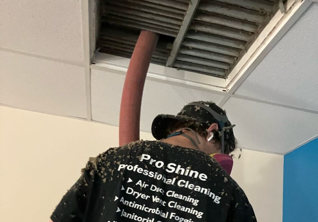Pro Shine team cleaning an air duct