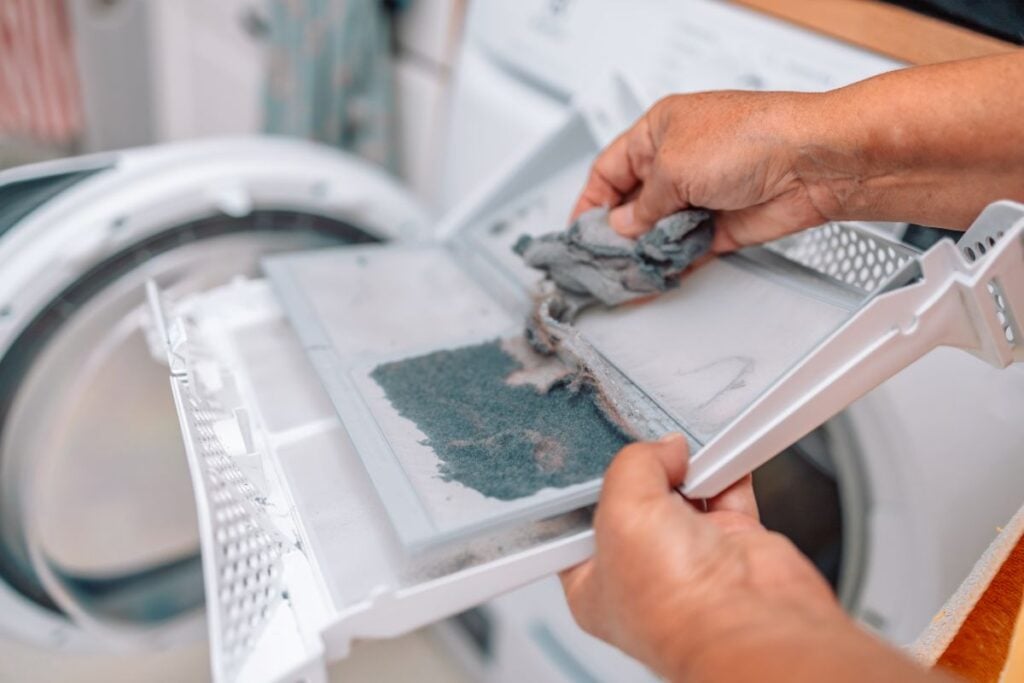 how to clean dryer lint trap hand cleaning using rag