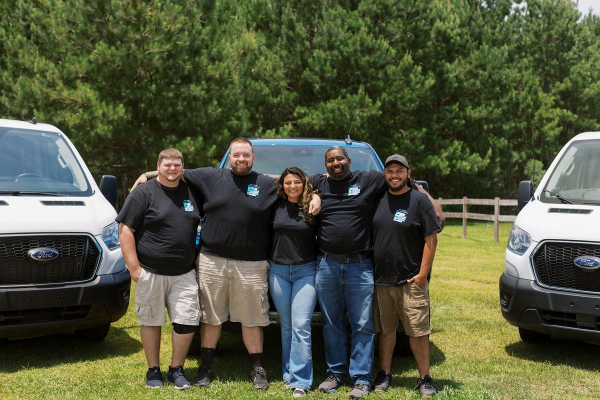 clogged dryer vent Pro Shine team against truck