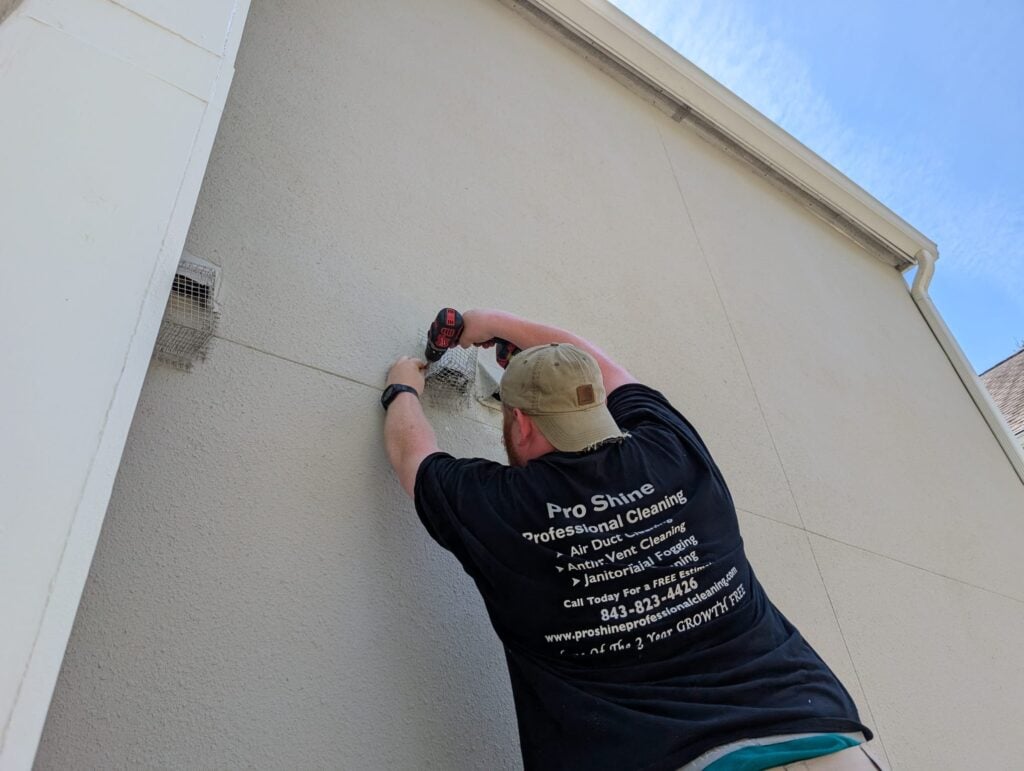 dryer fire prevention guy cleaning vent